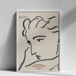 Poster d’art Henri Matisse Les Croquis Profil de femme encadré sous verre blanc sur fond de mur texturé épuré